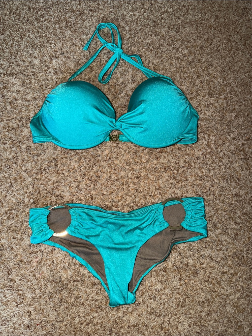 Victoria's Secret bikini set features a teal plunge-style top
